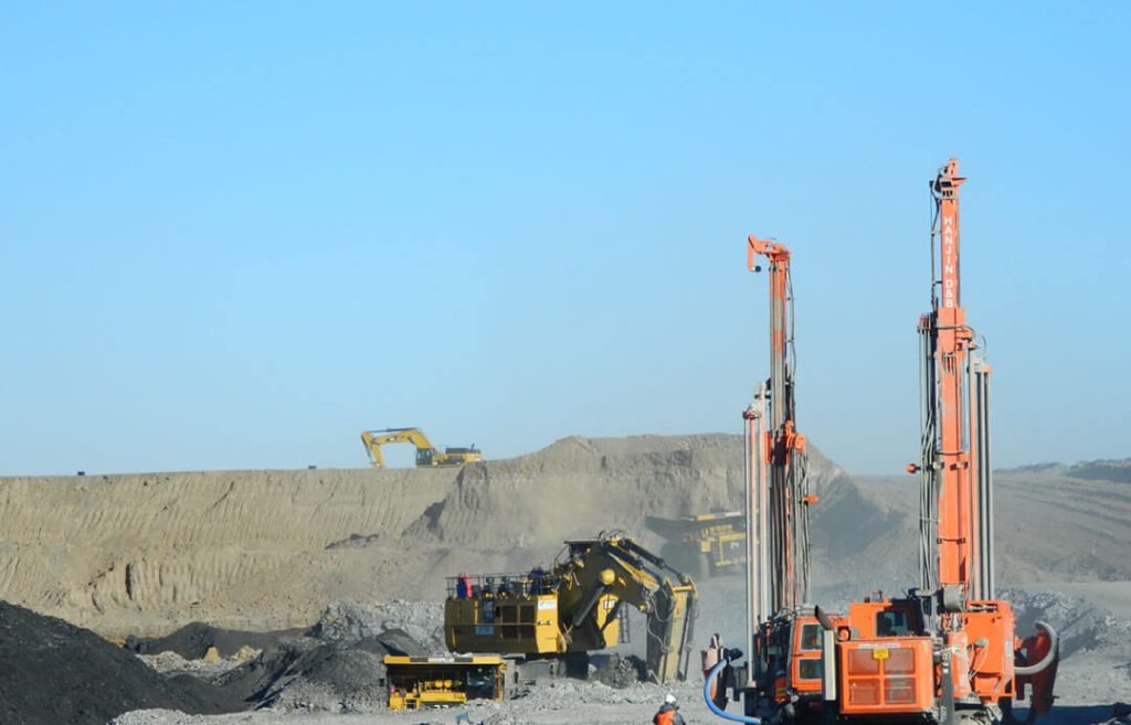 Drilling in open-pit mine